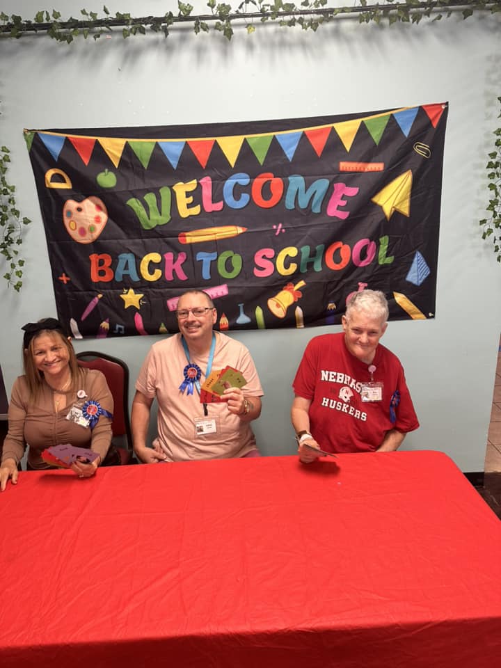 Social worker consulting with senior and family